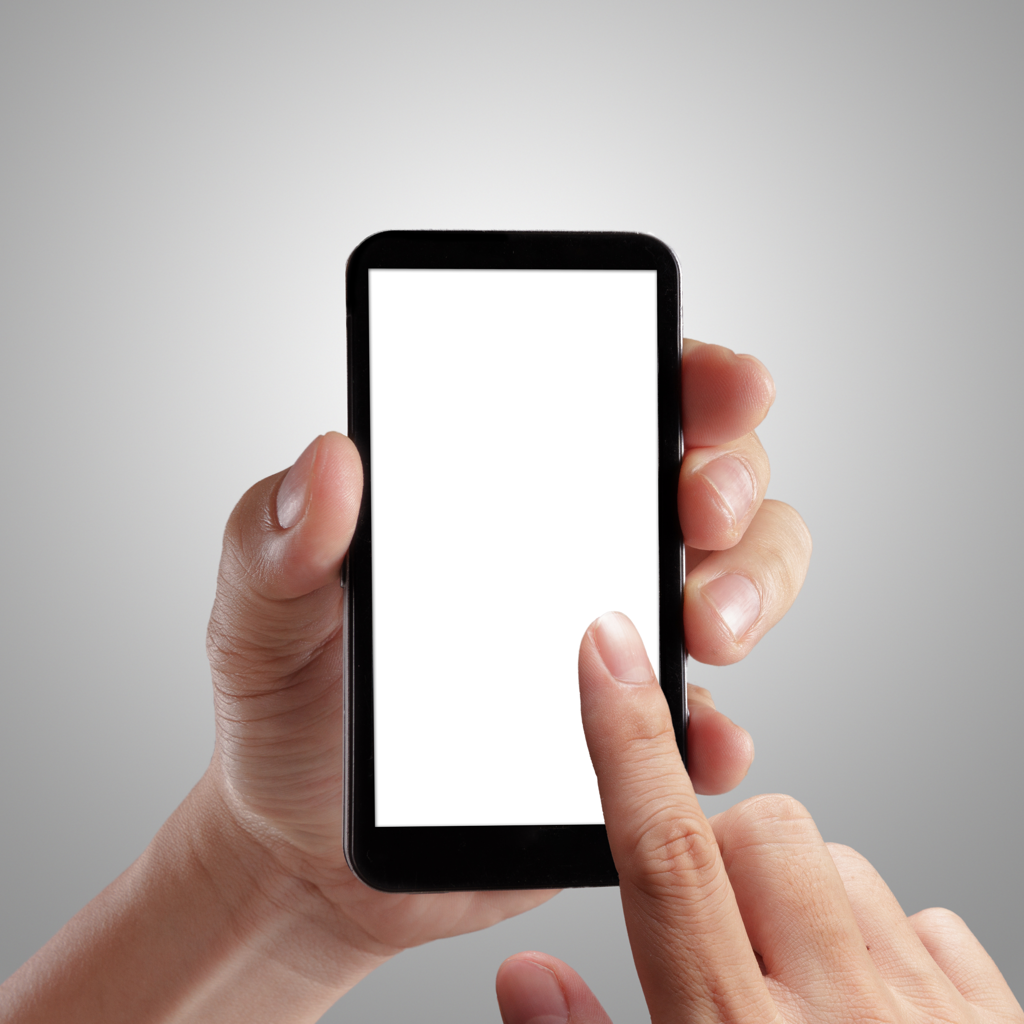 Hand holding mobile smart phone with blank screen. Isolated on white.